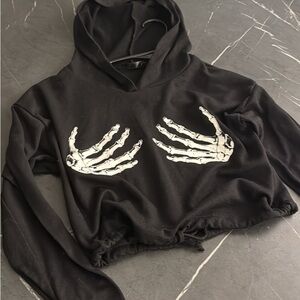 Cropped Black Hoodie with Skeleton Hand Design
